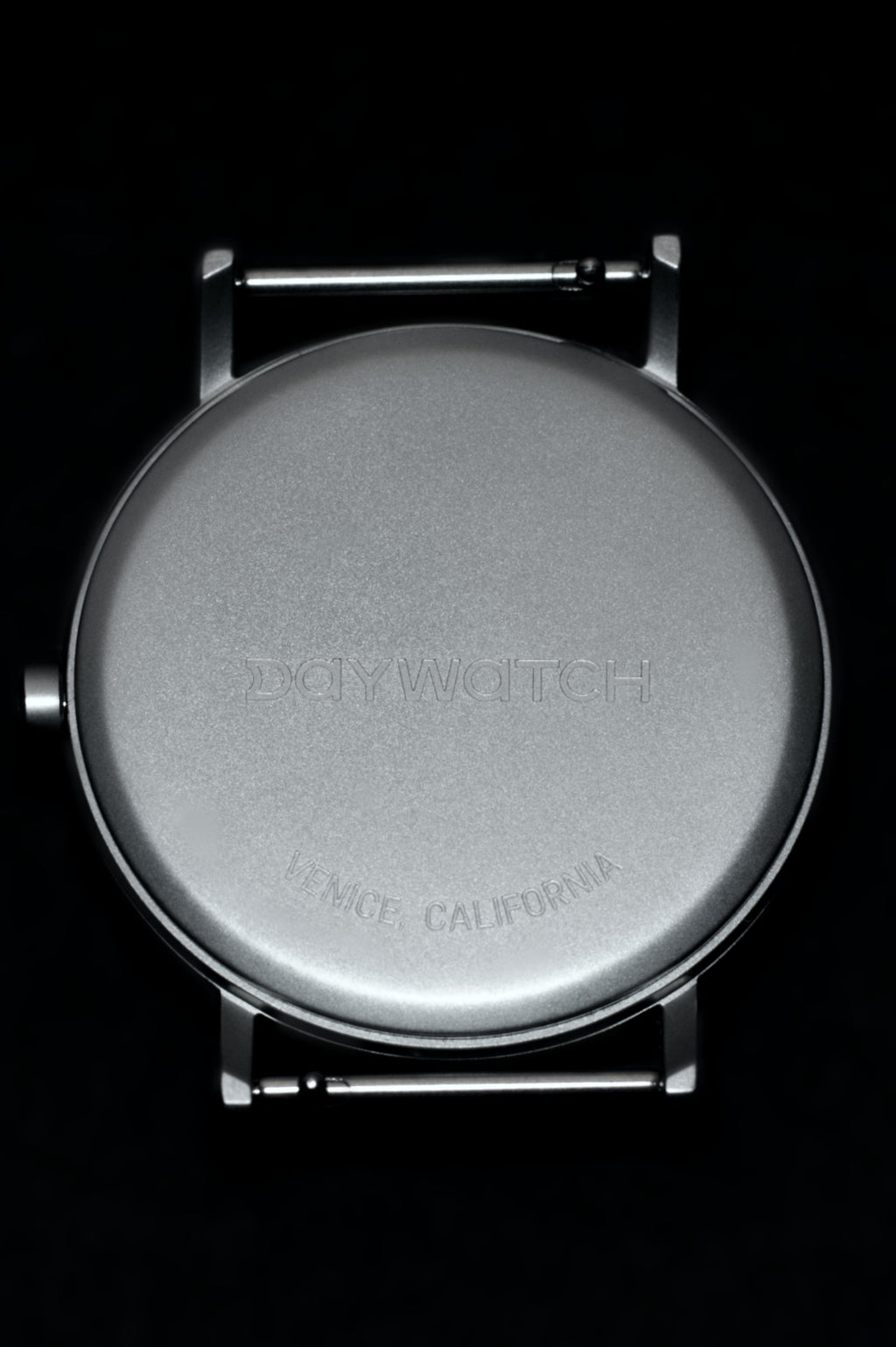 Back of The Point White Daywatch polished stainless steel case