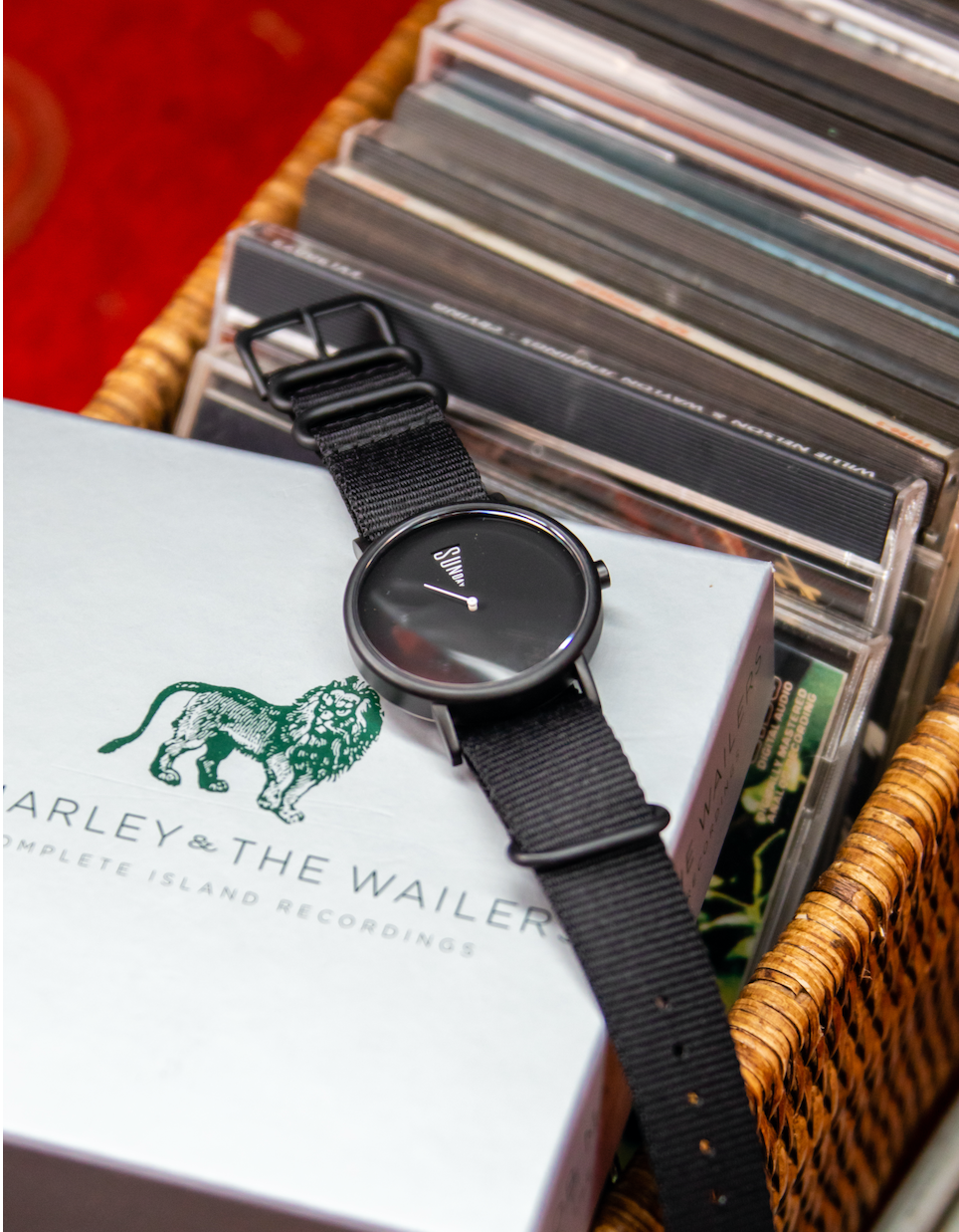 The Point Daywatch black pennant dial face — day of week display close-up